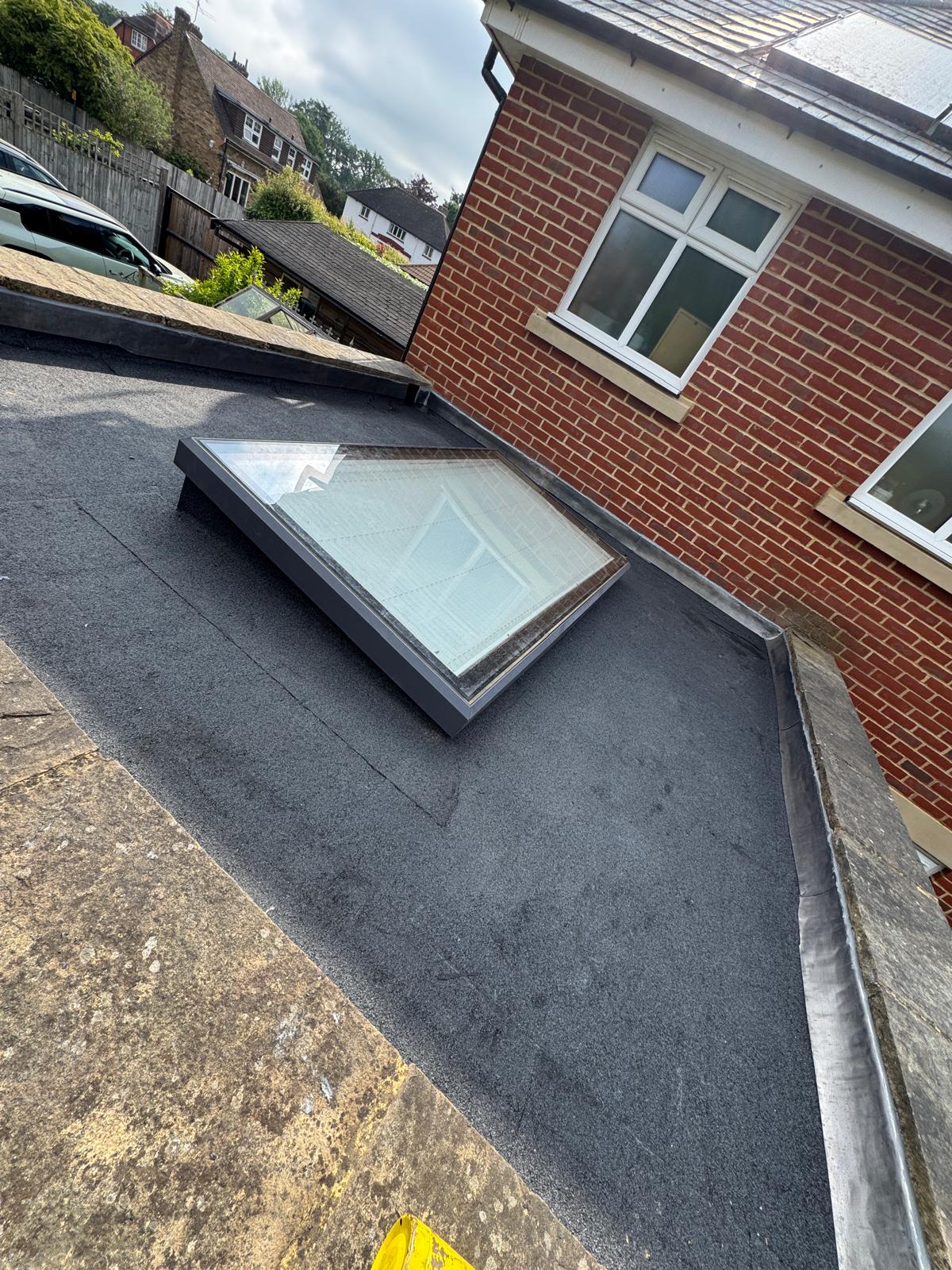 Flat roof replacement and skylight image